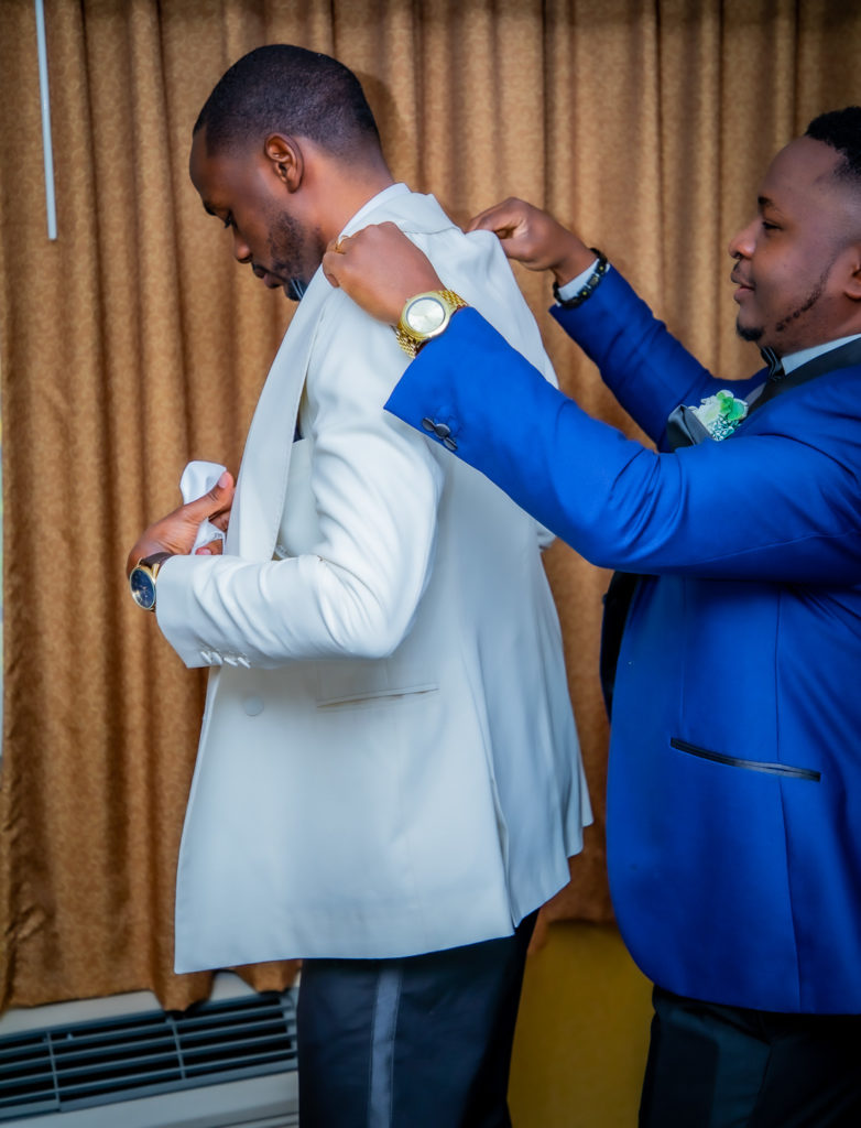 Congolese groom getting ready at the Radisson Hotel in Nashua, NH