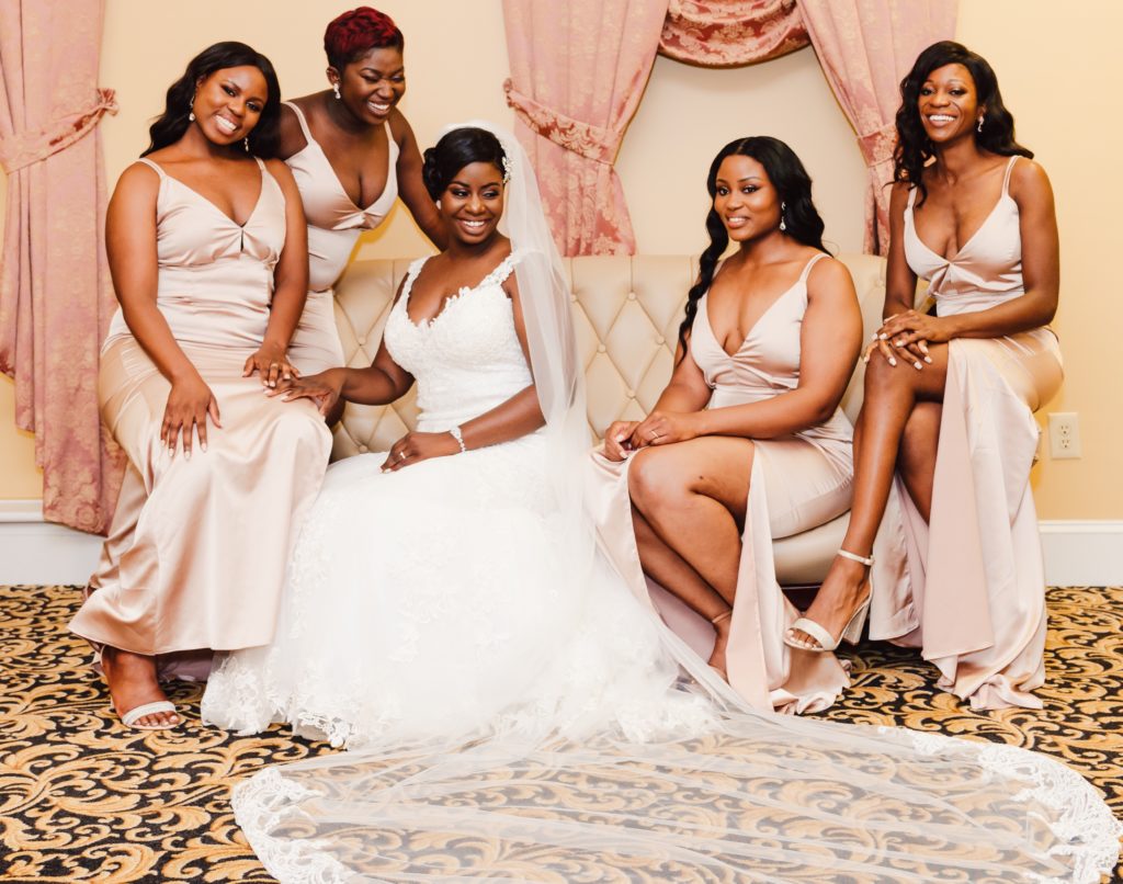 portrait of Multicultural bride and her bridesmaids