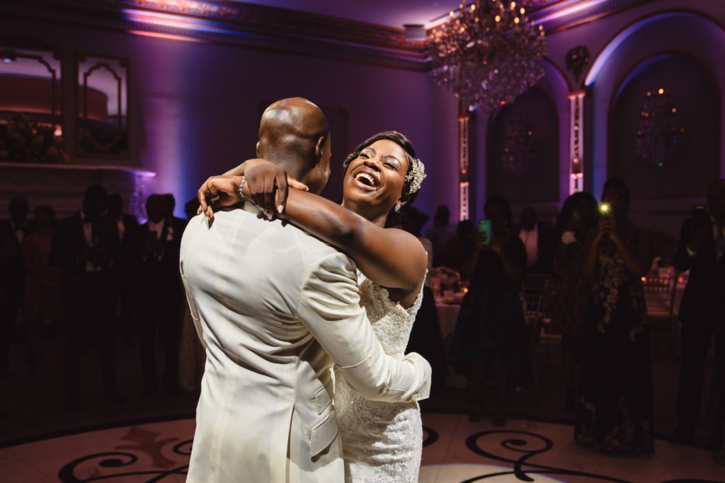 Ivoirian groom and Congolese bride doing the first dance at their wedding reception